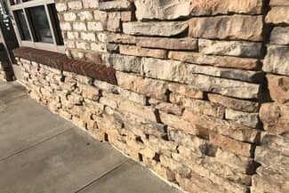 Natural stacked stone masonry exterior of business
